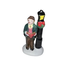 lemax christmas village man caroling by street lights